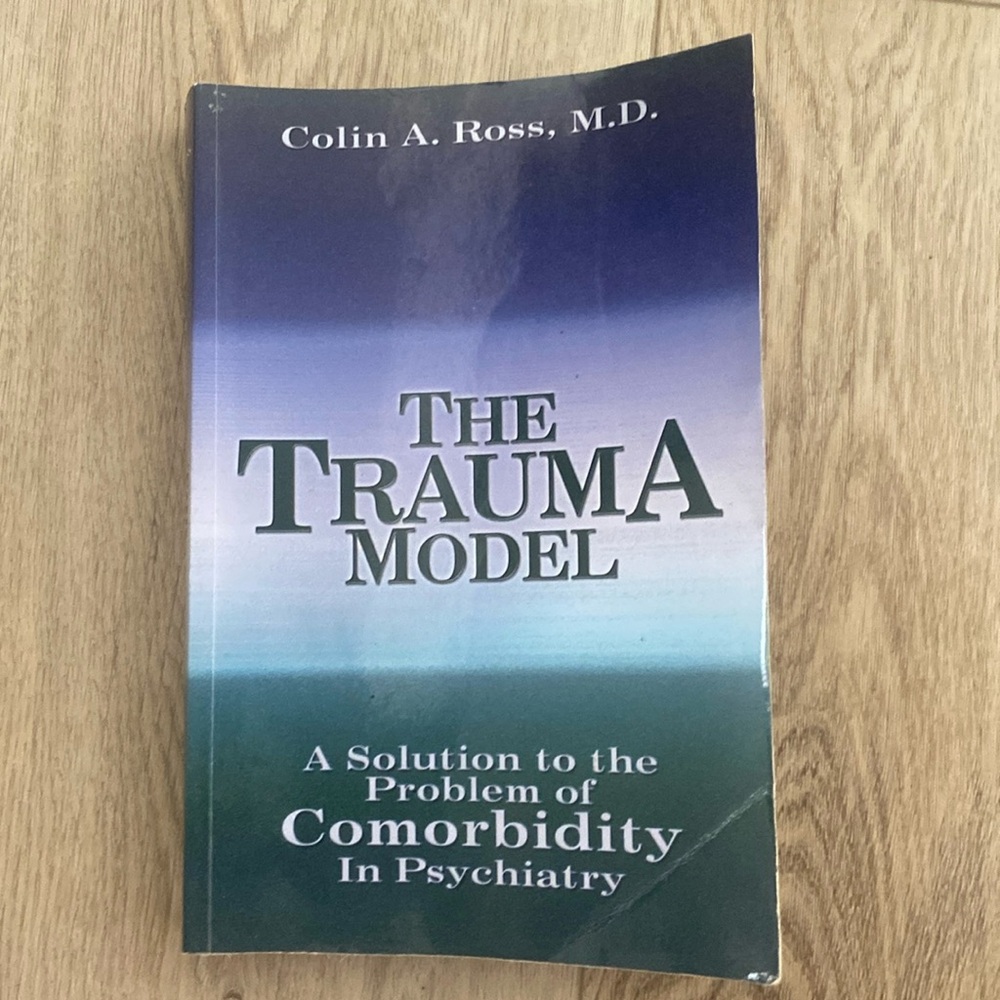 “The Trauma Model” by Colin A. Ross, M.D. - Paperback